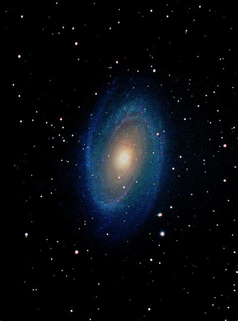 spiral galaxy photograph by tony and daphne hallas science photo library