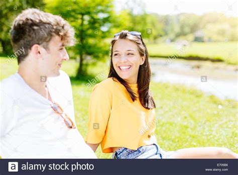 Couple Sitting On Grass Hi Res Stock Photography And Images Alamy
