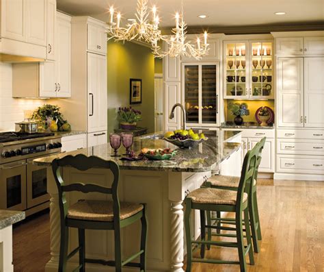 Similar style of kitchen design with some smaller cupboards with lighting for display above functional cupboards. Off White Kitchen with Mullion Cabinet Doors - Decora