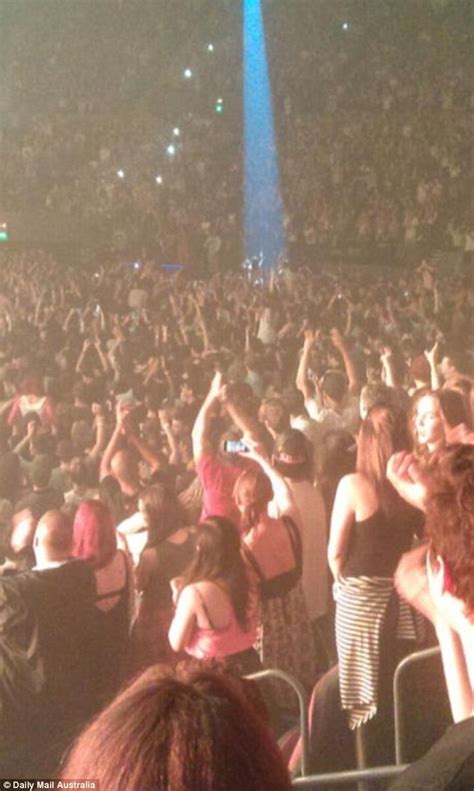 kim kardashian s reaction as female fans strip off during kanye west s sydney concert daily
