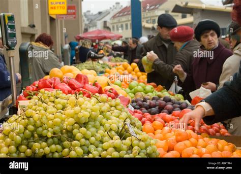 Shoppers At A Fruit And Vegetable Stall Outside Central Market