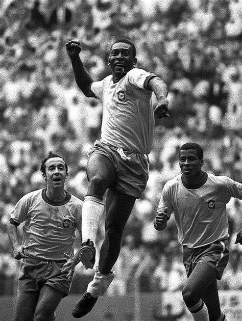 Pele Celebrates A Goal In The Background Accompanying Jairzinho And