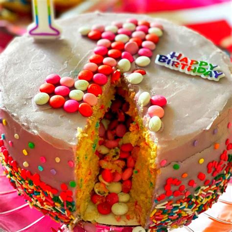 Want to reduce the carbs and calories in this recipe? Layered Birthday Cake with an M&M Surprise | Recipes | Kosher.com
