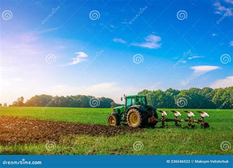 Tractor Sunset Agriculture Farm Machinery On Landscape Land Field