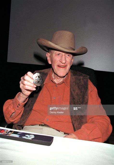 American Actor James Arness Wears A Cowboy Hat And Shows His James