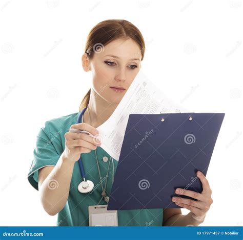 Portrait Of Pretty Nurse With Clipboard Royalty Free Stock Photography
