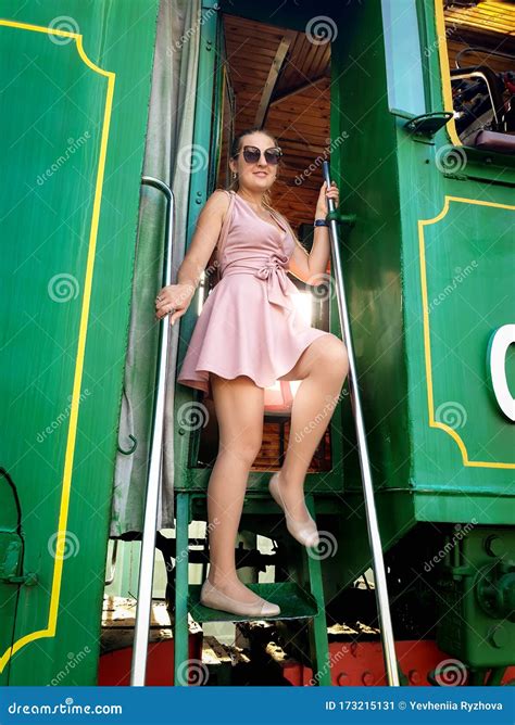 Young Woman In Short Dress Posing On Stairs Of Old Steam Locomotive Stock Image Image Of Dress