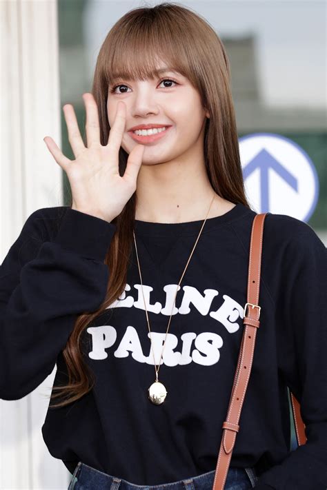 Blackpinks Lisa Shares An Office Appropriate Outfit That Works British Vogue