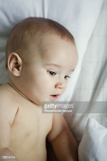 Baby Laying Down Side View Photos And Premium High Res Pictures Getty