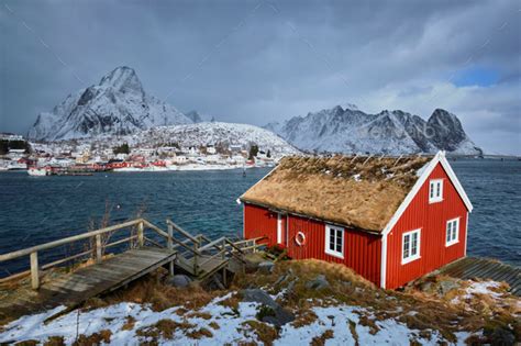 Traditional Red Rorbu House In Reine Village On Lofoten Islands Stock