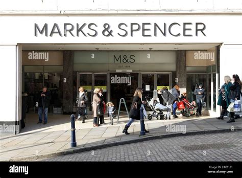 Pedestrians Outside Marks And Spencer Store Front On Guildford High