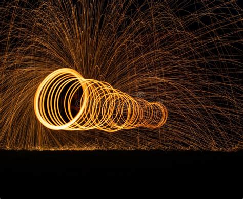 Long Exposure Shot Of Big Circles From The Steel Wool Fire With Sparks