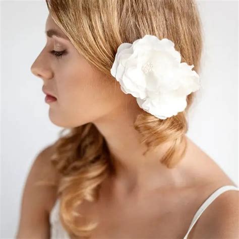 how to wear flowers in hair for wedding emmaline bride