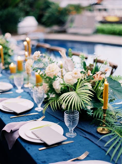 tropical meets elegant in these centerpieces created by catalina neal which feature roses