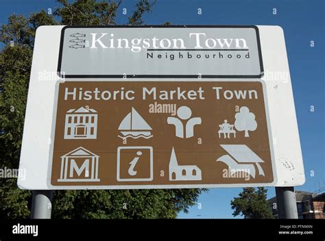 Kingston Historic Market Town Welcome Sign Displaying Symbols On