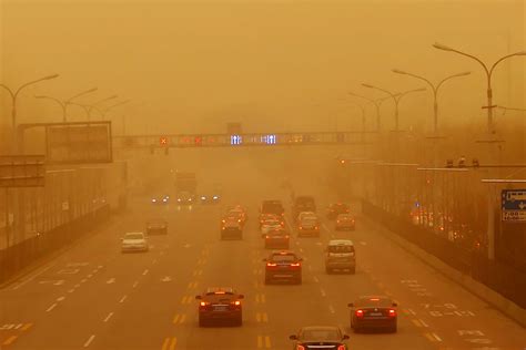 Record Breaking Beijing Sandstorm Results In Orange Skies And Low Air