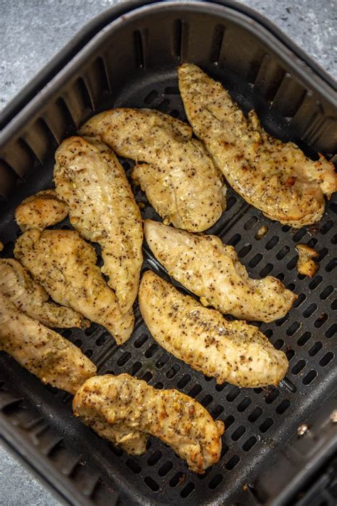 Place air fryer lid on top of basket and push air fryer button. Air Fryer Chicken Breast - Garnished Plate