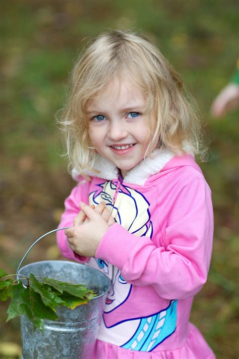 Free Picture Cute Blonde Young Girl Collects Acorns Leaves Bucket