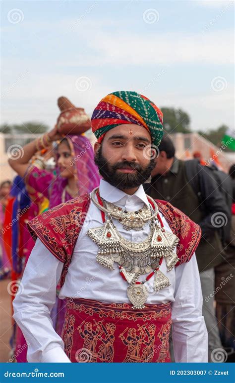 Indian Rajasthani Handsome Man In Traditional Clothes Camel Festival In Rajasthan India