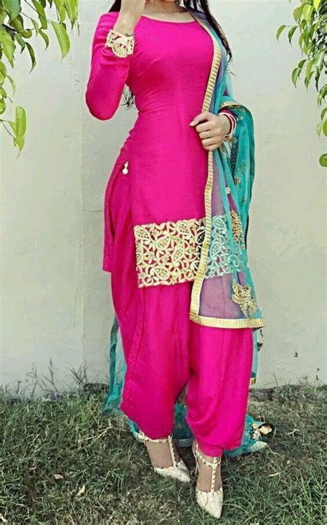 Hot Pink Punjabi Salwar Suit With Golden Handwork On Border And Dupatta