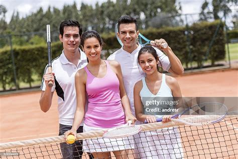 Friends Playing Tennis High Res Stock Photo Getty Images