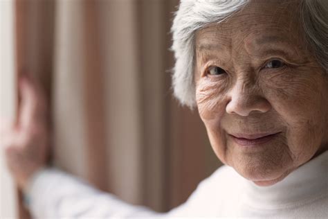 Senior Asian Woman Portrait Smiling Rehab First