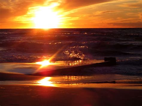 Sonnenuntergang Am Strand Foto And Bild Sonnenuntergang Strand Wellen