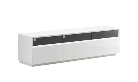 This modern tv console does just the trick. TV023 White Gloss TV Stand Black by J&M Furniture