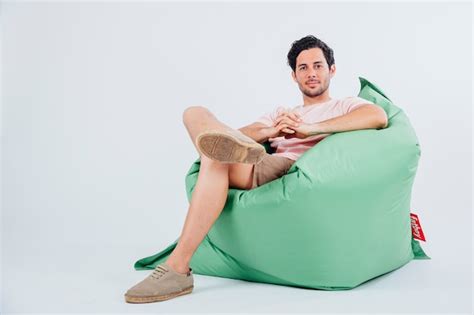 Man Chilling On Couch Photo Free Download