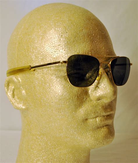 vintage 70s aviator sunglasses gold metal frames straight side arms glass lenses