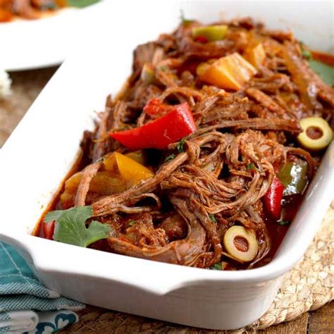 Cuban Ropa Vieja Features Tender Shredded Beef Simmered In The Most
