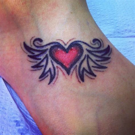 Heart And Wings Tattoo Wings Tattoo Tattoos Cool Tattoos