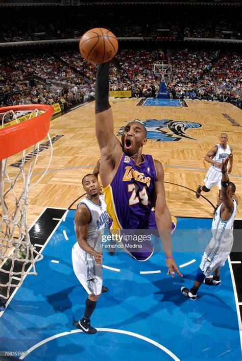 Kobe Bryant Of The Los Angeles Lakers Goes Up For A Dunk Against The