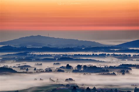 Areal View Photo Of City Surrounded With Mist During Sunrise Hd