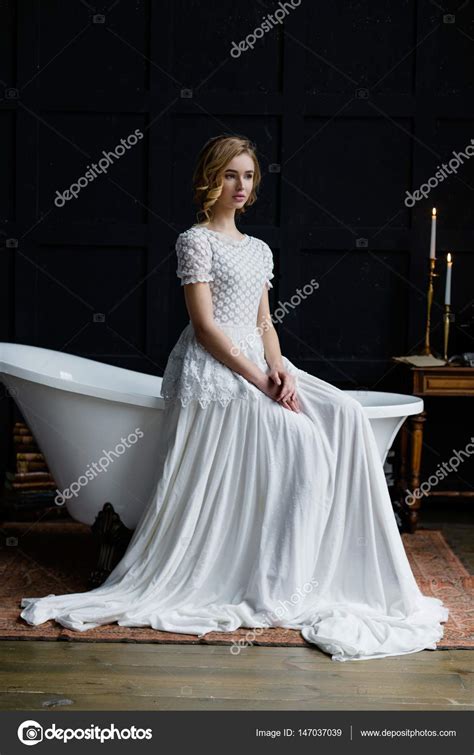 Woman In Long White Dress Stock Photo By Smmartynenko
