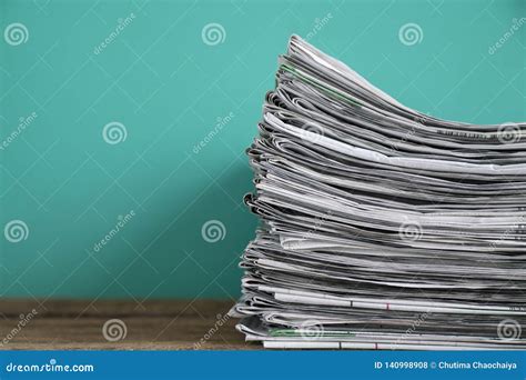Close Up Newspapers Folded And Stacked On The Table Stock Photo Image