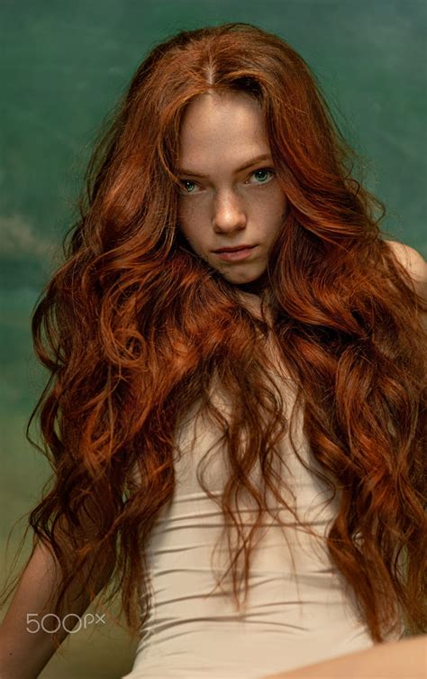 Portrait Of Sensual Beautiful Redhead Girl With Long Curly Hair By