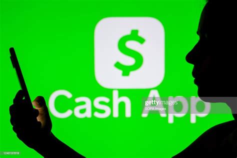In This Photo Illustration The Cash App Logo Seen In The Background