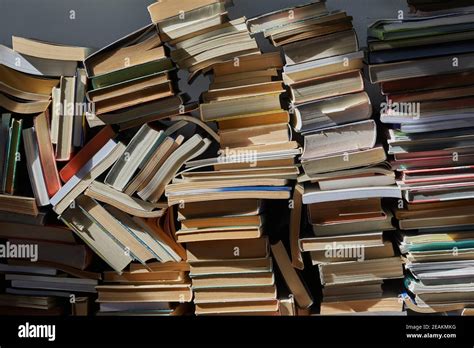 Wall Of Books Piled Up Stock Photo Alamy
