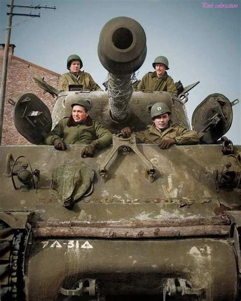 An American M4a3 Sherman Tank And Crew Of The 7th Armored Division In