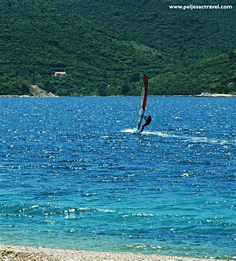 Top things to do on the peljesac peninsula · 1 | visit fortification walls in ston · 2 | harvest salt in ston · 3 | eat local · 4 | visit a winery . Windsurfing at Peljesac