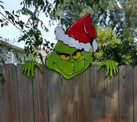 The Grinch Is Coming Over The Christmas Fence Climber Grinch