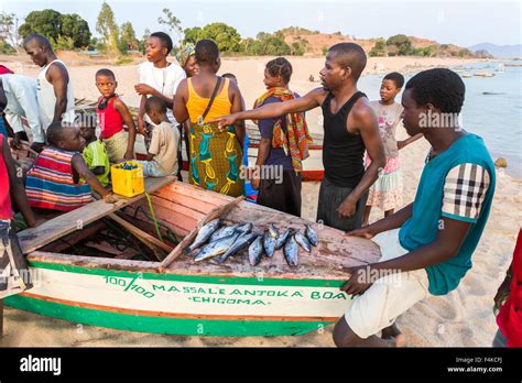 Fishermen Selling Their Catch To Local Villagers On The Beach Kaya