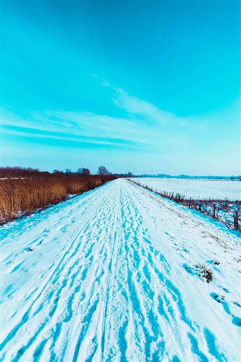 Road Snow Traces Field Winter Landscape Hd Phone Wallpaper Peakpx