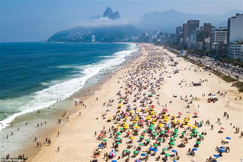 Thousands Pack On To Beaches In Rio De Janeiro Despite Brazil Suffering