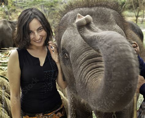 Woman And Elephants Stock Photo Adobe Stock