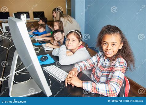 Group Of Kids Learning Pc On Computer Science Stock Photo Image Of