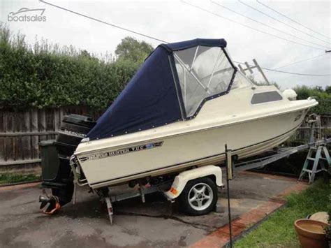 Haines Hunter V C Half Cabin Fibreglass Boat With Hp Outboard For
