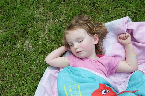Little Girl Napping Outdoors Stock Photo Dissolve