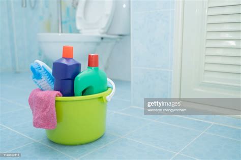 Cleaning With A Bucket And Cleaning Products On Blurred Background